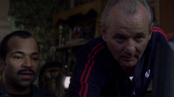 Movie still from “Broken Flowers” (2005), directed by Jim Jarmusch – An older man in a black and red jacket; Close Up shot, Over the shoulder angle