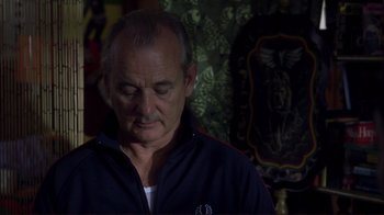 Movie still from “Broken Flowers” (2005), directed by Jim Jarmusch – An older man is looking down at his face; Close Up shot, Over the shoulder angle
