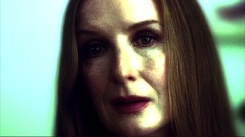 Movie still from “Broken Flowers” (2005), directed by Jim Jarmusch – A person with long hair; Close Up shot, Low angle