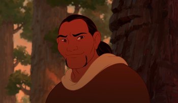 Movie still from “Brother Bear” (2003), directed by Robert Walker – An animated picture of a man with long black hair; Close Up shot, Over the shoulder angle