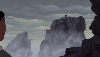 Movie still from “Brother Bear” (2003), directed by Robert Walker – An animal standing on top of a cliff; Extreme Wide shot, Low angle