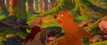 Movie still from “Brother Bear” (2003), directed by Robert Walker – A man and a bear in a forest; Wide shot, Low angle