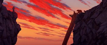Movie still from “Brother Bear” (2003), directed by Robert Walker – A red and orange sky with a tree stump in the foreground; Extreme Wide shot, Low angle