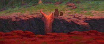 Movie still from “Brother Bear” (2003), directed by Robert Walker – A painting of a bear and a bear cub near a waterfall; Extreme Wide shot, Overhead angle