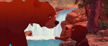 Movie still from “Brother Bear” (2003), directed by Robert Walker – A couple of brown bears standing next to each other near a waterfall; Medium shot, Over the shoulder angle