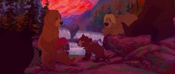 Movie still from “Brother Bear” (2003), directed by Robert Walker – A painting of a bear and two cubs in front of a waterfall; Wide shot, Low angle
