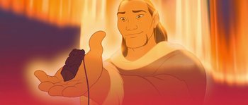 Movie still from “Brother Bear” (2003), directed by Robert Walker – An animated picture of a man holding a video game controller; Close Up shot, Over the shoulder angle