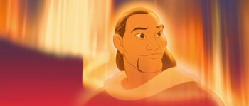 Movie still from “Brother Bear” (2003), directed by Robert Walker – An animated picture of a man with long hair and a beard; Close Up shot, Over the shoulder angle