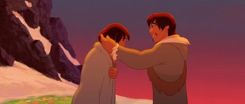 Movie still from “Brother Bear” (2003), directed by Robert Walker – A couple of people standing next to each other; Medium shot, Over the shoulder angle