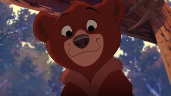 Movie still from “Brother Bear 2” (2006), directed by Ben Gluck – A brown teddy bear is looking at the camera; Close Up shot, Low angle