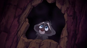 Movie still from “Brother Bear 2” (2006), directed by Ben Gluck – A picture of a cartoon character in a cave; Wide shot, Low angle
