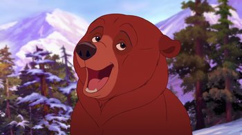 Movie still from “Brother Bear 2” (2006), directed by Ben Gluck – A brown bear with a mountain in the background; Close Up shot, Low angle