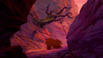 Movie still from “Brother Bear 2” (2006), directed by Ben Gluck – An animated scene of a bear in a cave; Extreme Wide shot, Low angle