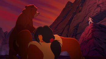 Movie still from “Brother Bear 2” (2006), directed by Ben Gluck – A couple of animated bears sitting on top of a mountain; Wide shot, Low angle