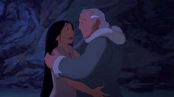 Movie still from “Brother Bear 2” (2006), directed by Ben Gluck – An old man and a young woman are standing together; Medium shot, Over the shoulder angle