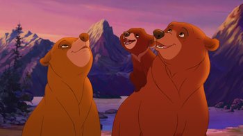 Movie still from “Brother Bear 2” (2006), directed by Ben Gluck – A group of three brown bears standing next to each other; Medium shot, Low angle