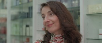 Movie still from “Bullhead” (2011), directed by Michaël R. Roskam – A person wearing a floral shirt; Close Up shot, Over the shoulder angle