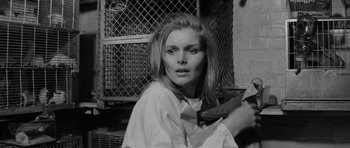 Movie still from “Bunny Lake Is Missing” (1965), directed by Otto Preminger – Black and white photograph of a young woman with long blonde hair; Close Up shot, Low angle