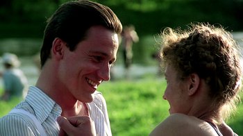 Movie still from “Burnt by the Sun” (1994), directed by Nikita Mikhalkov – A man and a woman are talking to each other; Close Up shot, Over the shoulder angle