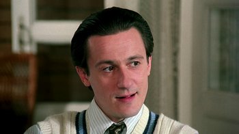 Movie still from “Burnt by the Sun” (1994), directed by Nikita Mikhalkov – A person wearing a tie; Close Up shot, Low angle