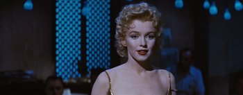 Movie still from “Bus Stop” (1956), directed by Joshua Logan – A person with blonde hair; Close Up shot, Over the shoulder angle