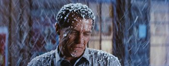 Movie still from “Bus Stop” (1956), directed by Joshua Logan – A person with snow on his head; Close Up shot, High angle