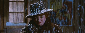 Movie still from “Bus Stop” (1956), directed by Joshua Logan – A woman wearing a hat with snow all over her face; Close Up shot, Low angle