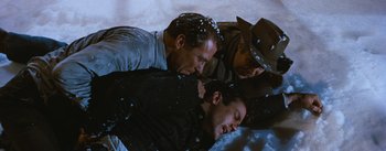 Movie still from “Bus Stop” (1956), directed by Joshua Logan – A group of people laying on the ground; Medium shot, Low angle