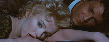 Movie still from “Bus Stop” (1956), directed by Joshua Logan – A person lying on the ground; Close Up shot, High angle