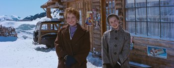 Movie still from “Bus Stop” (1956), directed by Joshua Logan – Two women standing next to each other in the snow; Medium shot, Low angle