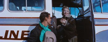 Movie still from “Bus Stop” (1956), directed by Joshua Logan – A man and a woman on a bus; Medium shot, Low angle