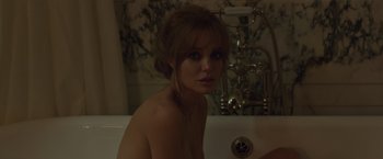 Movie still from “By the Sea” (2015), directed by Angelina Jolie – A woman sitting in a bath tub in front of a sink; Close Up shot, High angle