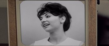 Movie still from “Bye Bye Birdie” (1963), directed by George Sidney – A black - and - white photo of a woman smiling; Close Up shot, High angle