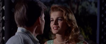 Movie still from “Bye Bye Birdie” (1963), directed by George Sidney – A young man and a young woman talking to each other; Close Up shot, Low angle
