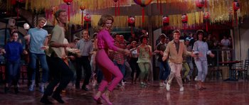 Movie still from “Bye Bye Birdie” (1963), directed by George Sidney – A group of people dancing in a room; Wide shot, High angle