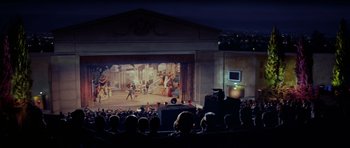 Movie still from “Bye Bye Birdie” (1963), directed by George Sidney – A crowd of people sitting in front of a stage; Extreme Wide shot, High angle