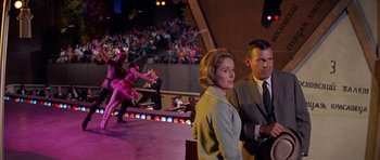 Movie still from “Bye Bye Birdie” (1963), directed by George Sidney – A man and a woman are watching an event; Medium shot, Low angle