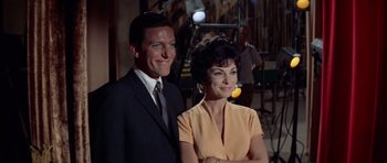 Movie still from “Bye Bye Birdie” (1963), directed by George Sidney – A man and a woman standing next to each other; Close Up shot, High angle