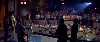 Movie still from “Bye Bye Birdie” (1963), directed by George Sidney – A man and a woman in front of an audience; Extreme Wide shot, High angle