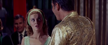 Movie still from “Bye Bye Birdie” (1963), directed by George Sidney – A man and a woman are looking at each other; Close Up shot, Over the shoulder angle