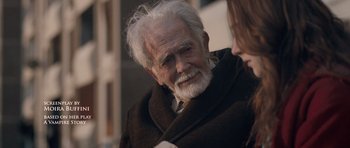 Movie still from “Byzantium” (2012), directed by Neil Jordan – An old man with a white beard is talking to a woman; Close Up shot, Over the shoulder angle