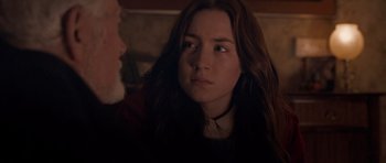 Movie still from “Byzantium” (2012), directed by Neil Jordan – A young woman with long brown hair stares into the distance; Close Up shot, Over the shoulder angle