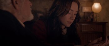 Movie still from “Byzantium” (2012), directed by Neil Jordan – A woman sitting in front of a computer screen; Close Up shot, Over the shoulder angle