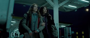 Movie still from “Byzantium” (2012), directed by Neil Jordan – Two women are standing next to each other; Medium shot, Low angle