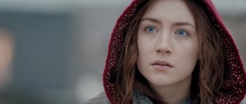 Movie still from “Byzantium” (2012), directed by Neil Jordan – A person wearing a hooded jacket; Close Up shot, Over the shoulder angle