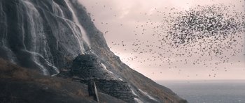 Movie still from “Byzantium” (2012), directed by Neil Jordan – A flock of birds flying over a cliff; Extreme Wide shot, Low angle