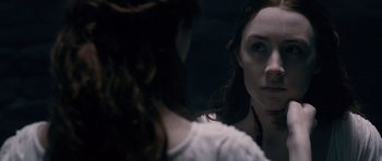 Movie still from “Byzantium” (2012), directed by Neil Jordan – A woman looking at her reflection in a mirror; Close Up shot, Over the shoulder angle