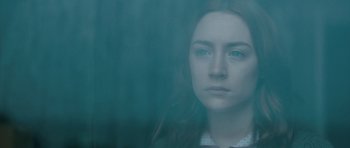 Movie still from “Byzantium” (2012), directed by Neil Jordan – A woman with blue eyes stares into the distance; Close Up shot, Over the shoulder angle