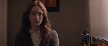 Movie still from “Byzantium” (2012), directed by Neil Jordan – A woman with long red hair is looking at the camera; Close Up shot, Over the shoulder angle