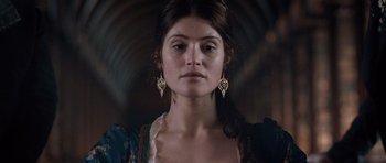 Movie still from “Byzantium” (2012), directed by Neil Jordan – A person wearing a dress; Close Up shot, Low angle